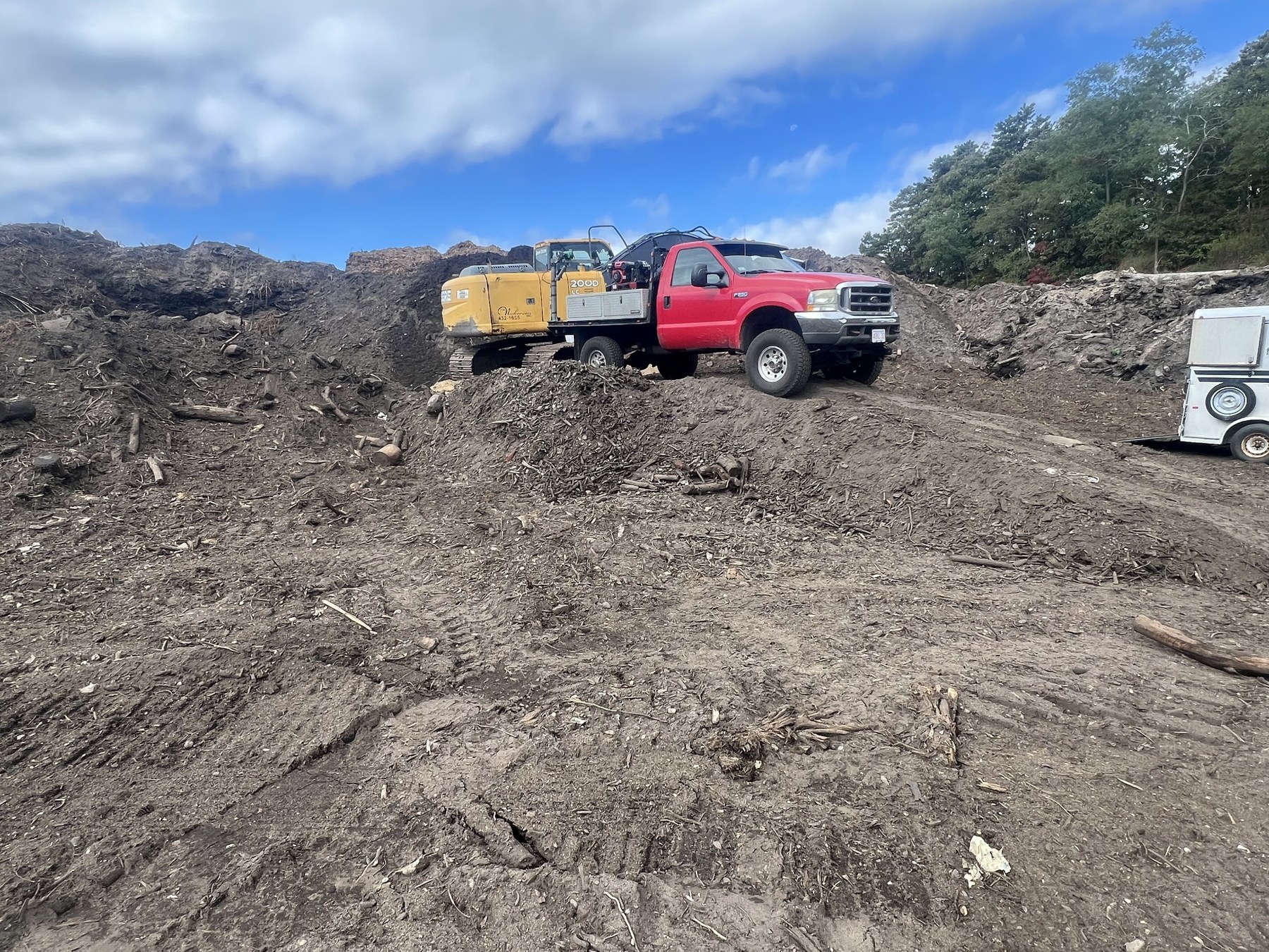 Heavy equipment and Bober Repair service truck
